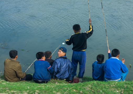 North Korean children fishing in a lake, Kangwon Province, Wonsan, North Korea