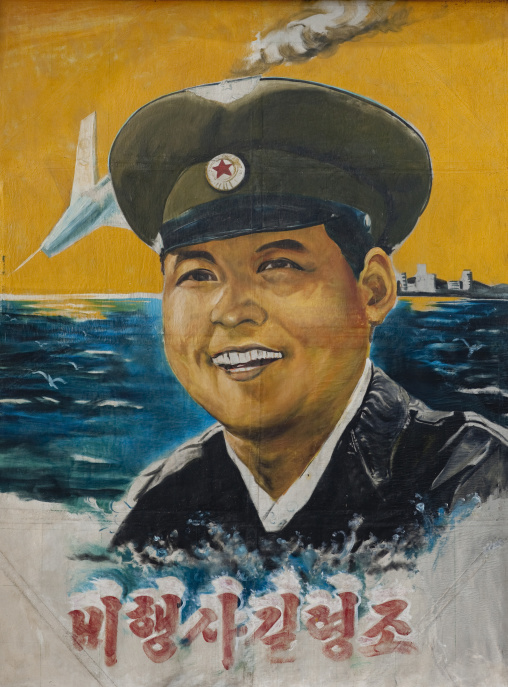 Gil young-jo North Korean army pilot on a movie poster, Kangwon Province, Chonsam Cooperative Farm, North Korea