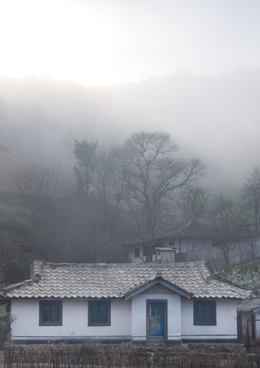 Countryside house in the fog, Kangwon Province, Chonsam Cooperative Farm, North Korea