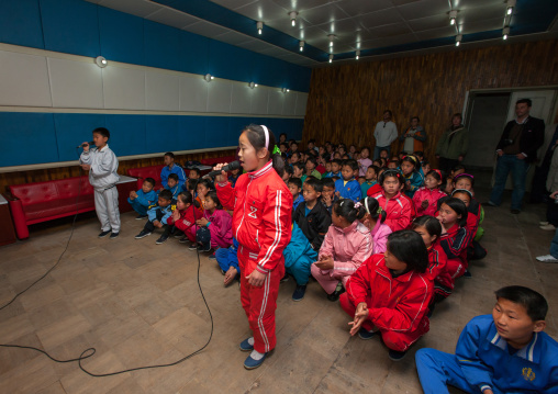 North Korean children singing during a karaoke Songdowon international children's camp, Kangwon Province, Wonsan, North Korea