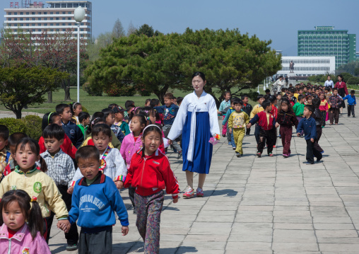 North Korean pupils with their teacher in the street, Kangwon Province, Wonsan, North Korea