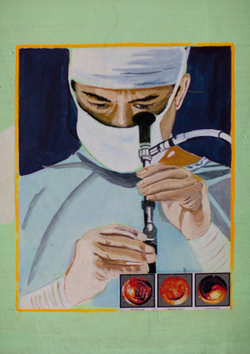 Poster depicting a North Korean doctor looking in an endoscope in a North Korean hospital, Pyongan Province, Pyongyang, North Korea
