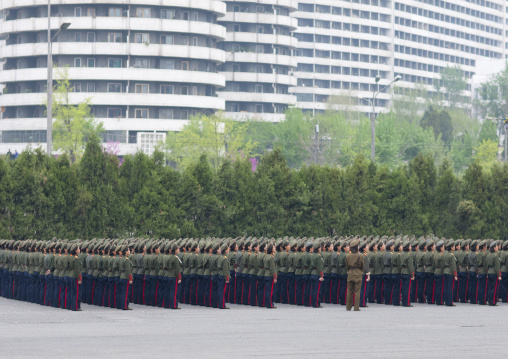 North Korean women military parade in the street in front of buildings, Pyongan Province, Pyongyang, North Korea