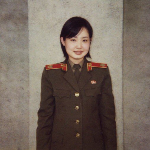 Polaroid of a North Korean guide called Kim at the victorious fatherland liberation war museum, Pyongan Province, Pyongyang, North Korea