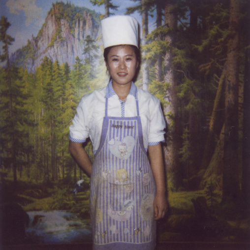 Polaroid of a smiling North Korean cook woman, Pyongan Province, Pyongyang, North Korea