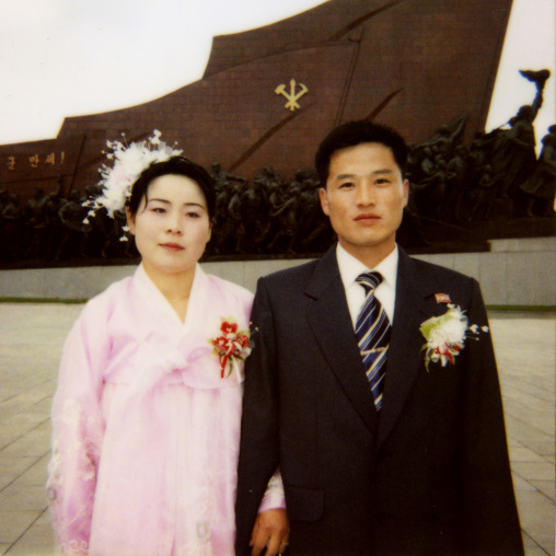Polaroid of North Korean couple celebrating their wedding in Mansudae Grand monument, Pyongan Province, Pyongyang, North Korea