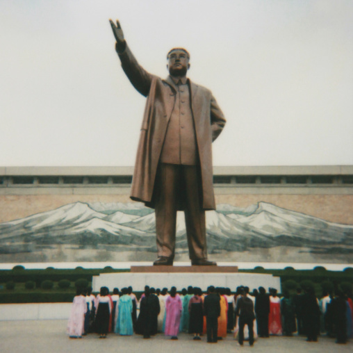 Polaroid of North Korean people paying respect to Kim il Sung statue in Mansudae Grand monument, Pyongan Province, Pyongyang, North Korea