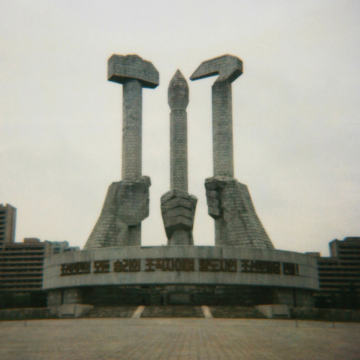 Polaroid of the monument to Party founding made for the 50-year anniversary of the workers' Party of Korea, Pyongan Province, Pyongyang, North Korea