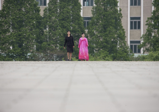 North Korean women walking in the street, Pyongan Province, Pyongyang, North Korea