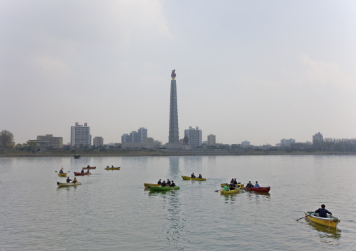 Boats on the Taedong river with the Juche tower in the background, Pyongan Province, Pyongyang, North Korea