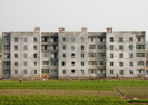 Building with propaganda slogan on the top, North Hwanghae Province, Kaesong, North Korea