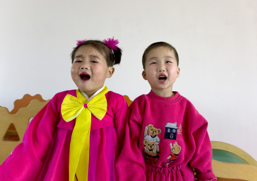 North Korean children in an orphanage singing a patriotic song, South Pyongan Province, Nampo, North Korea