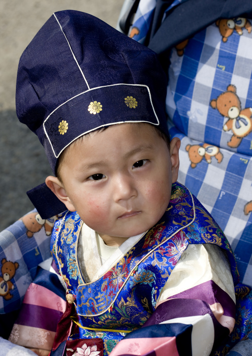 One year old North Korean toddler with the traditional hat, Pyongan Province, Pyongyang, North Korea