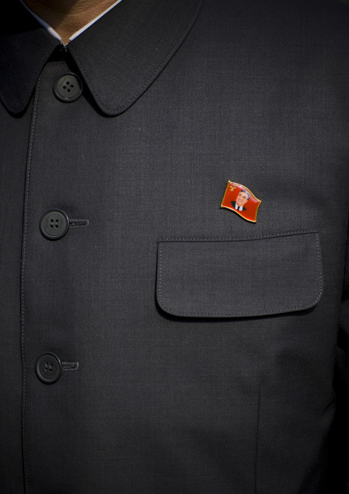Kim il Sung pin on a man suit, Pyongan Province, Pyongyang, North Korea