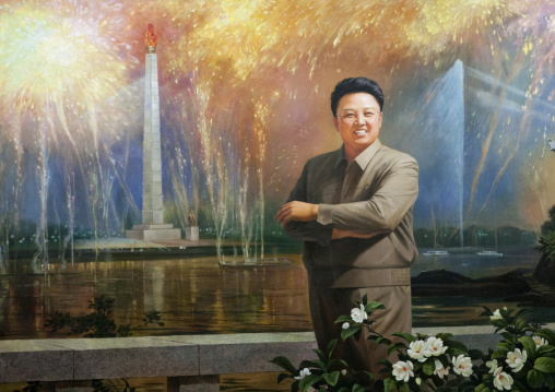 Smiling Kim Jong il in front of Juche tower propaganda poster, Pyongan Province, Pyongyang, North Korea