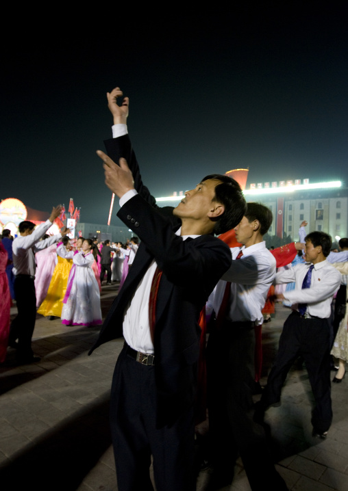 North Korean students dancing to celebrate april 15 the birth anniversary of Kim Il-sung on Kim il Sung square, Pyongan Province, Pyongyang, North Korea