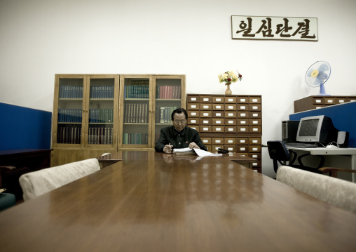 North Korean expert who answers the questions of the visitors in the Grand people's study house, Pyongan Province, Pyongyang, North Korea