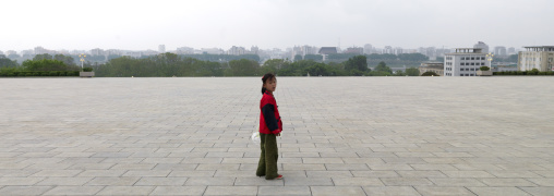 North Korean child in Mansudae Grand monument, Pyongan Province, Pyongyang, North Korea