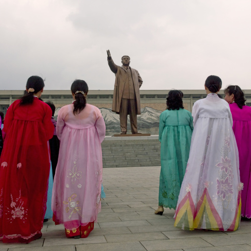 North Korean women paying respect to Kim il Sung statue in Mansudae Grand monument, Pyongan Province, Pyongyang, North Korea