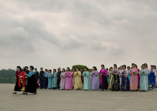 North Korean women going to pay respect to the statues of the Dear Leaders in Mansudae Grand monument, Pyongan Province, Pyongyang, North Korea