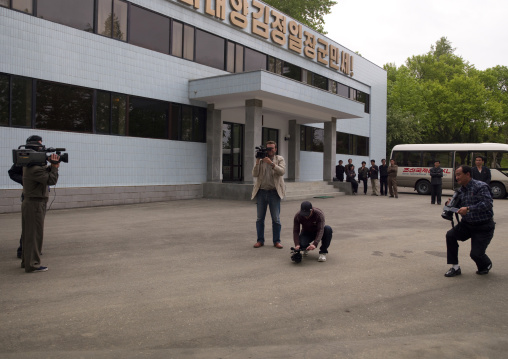 Foreign journalists filmed by North Korean television crew, Pyongan Province, Pyongyang, North Korea