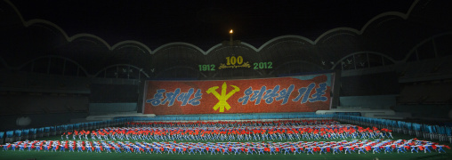 Panoramic view of the Arirang mass games with North Korean performers and the workers' Party of North Korea logo in may day stadium, Pyongan Province, Pyongyang, North Korea