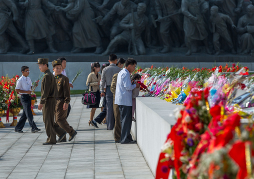 North Korean people putting flowers in Mansudae Grand monument, Pyongan Province, Pyongyang, North Korea