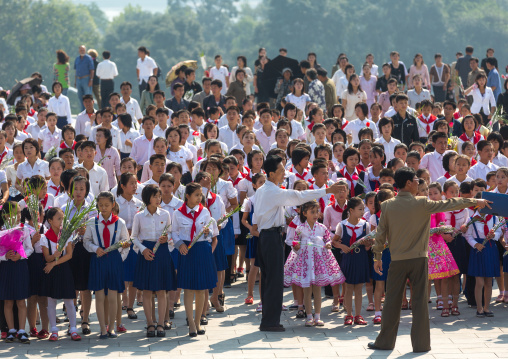 North Korean pioneers from the Korean children's union in the Grand monument on Mansu hill, Pyongan Province, Pyongyang, North Korea