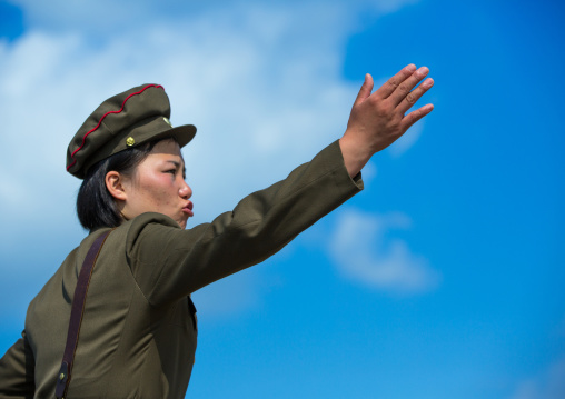 North Korean female soldier giving instructions, Pyongan Province, Pyongyang, North Korea