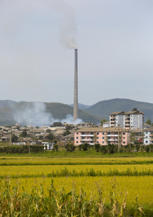 Giant factory chimney in a village, South Hamgyong Province, Hamhung, North Korea