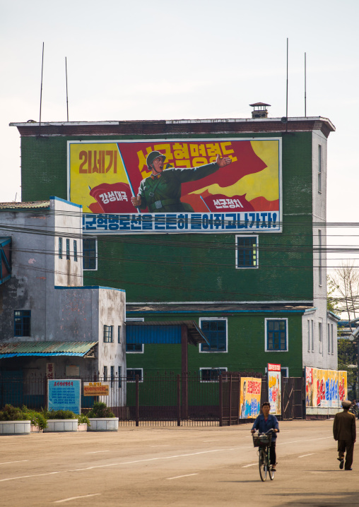North Korean propaganda billboard about the songun at Hungnam nitrogen fertilizer plant, South Hamgyong Province, Hamhung, North Korea