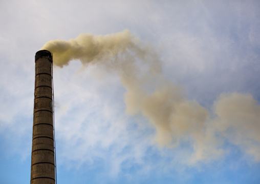 Yellow smoke coming out of a chimney in Hungnam nitrogen fertilizer plant, South Hamgyong Province, Hamhung, North Korea