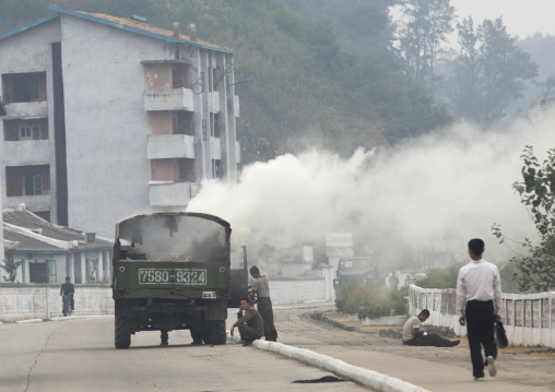 Wood-burning steam truck out of order on a road, South Hamgyong Province, Hamhung, North Korea