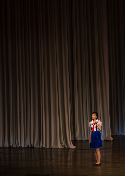 Young North Korean pioneer girl during a show in Mangyongdae children's palace, Pyongan Province, Pyongyang, North Korea