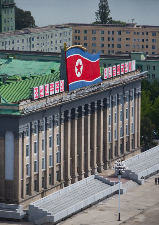 Government building in Kim Il-sung square with the slogan long live the democratic people's republic of korea!, Pyongan Province, Pyongyang, North Korea