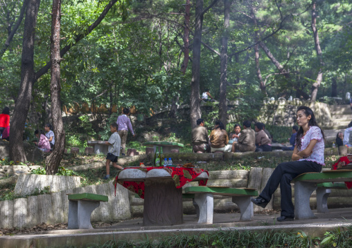 North Korean people enjoying a picnic in a park on a sunday, Pyongan Province, Pyongyang, North Korea