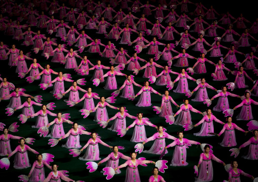 North Korean women dancing in choson-ot during the Arirang mass games in may day stadium, Pyongan Province, Pyongyang, North Korea