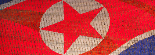 North Korean flag made by human pixels holding up colored boards during Arirang mass games in may day stadium, Pyongan Province, Pyongyang, North Korea