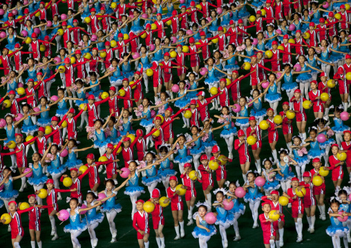 North Korean children performing with balloons during the Arirang mass games in may day stadium, Pyongan Province, Pyongyang, North Korea