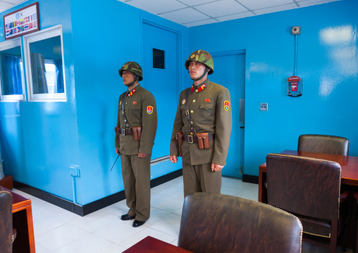 North Korean soldiers in the conference room of the United Nations on the demarcation line in the Demilitarized Zone, North Hwanghae Province, Panmunjom, North Korea