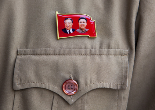 Dear Leaders badge on the shirt of a worker, North Hwanghae Province, Panmunjom, North Korea