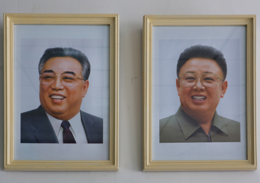 Kim il Sung and Kim Jong il official portraits in a house, North Hwanghae Province, Kaesong, North Korea