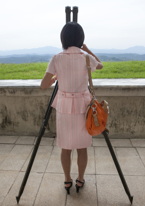 North Korean guide looking at south Korea from the wall section of the Demilitarized Zone, North Hwanghae Province, Panmunjom, North Korea