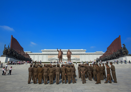 North Korean soldiers paying respect to the two statues of the Dear Leaders in the Grand monument on Mansu hill, Pyongan Province, Pyongyang, North Korea
