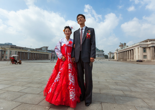 North Korean couple newly wed in Kim il Sung square, Pyongan Province, Pyongyang, North Korea