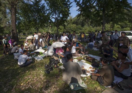 North Korean people having picnic in a park on september 9 day of the foundation of the republic, Pyongan Province, Pyongyang, North Korea