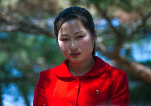 Portrait of a North Korean woman under trees, North Hamgyong Province, Chilbo Sea, North Korea