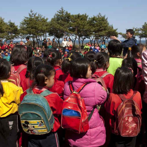 Young pioneers with Mickey mouse backpacks in a summer camp, North Hamgyong Province, Chilbo Sea, North Korea