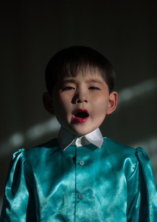 North Korean boy singing in Tchang Gwang school, North Hamgyong Province, Chongjin, North Korea