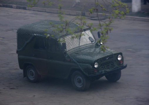 North Korean army jeep with camouflage in the street, North Hamgyong Province, Chongjin, North Korea